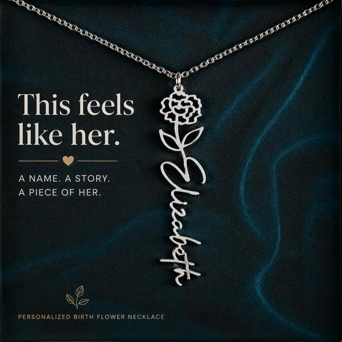 Personalized birth flower necklace with floral design and name 'Elizabeth' on a dark background.