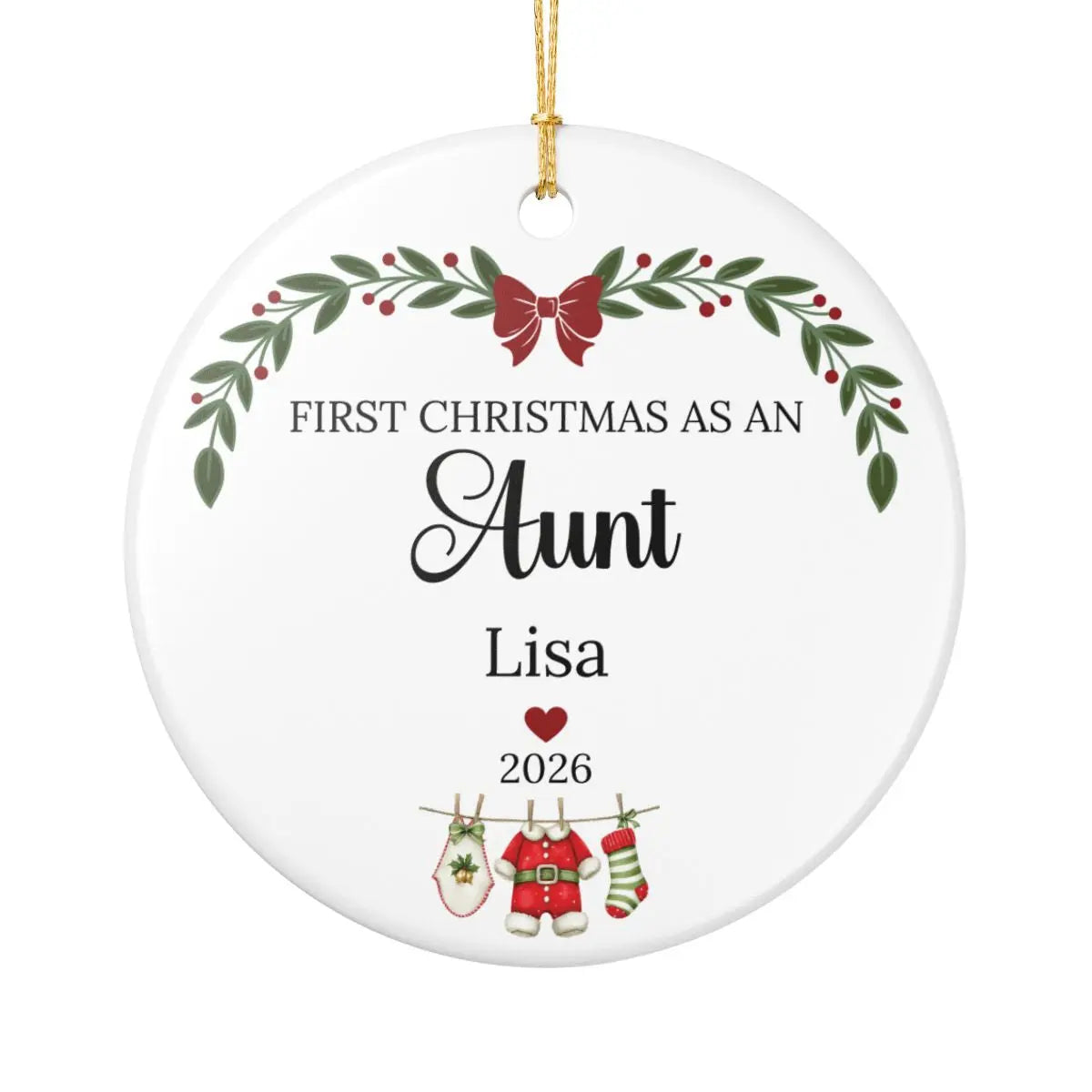 A round white personalized Christmas ornament with a gold hanging string. The ornament features printed black text reading 'FIRST CHRISTMAS AS AN Aunt' with the name 'Lisa' below, plus holiday illustrations including a green wreath with red berries, a red bow, a red heart, and Christmas stockings on a clothesline.