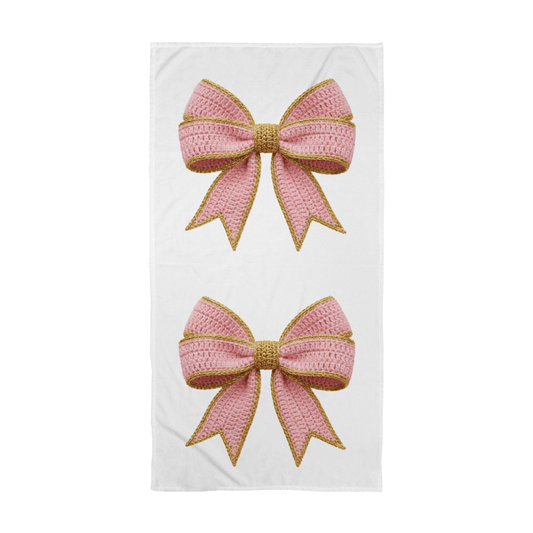 A Perfectly Pink Coquette Yarn Bow on a Bath Towel - Flourish Love Shop