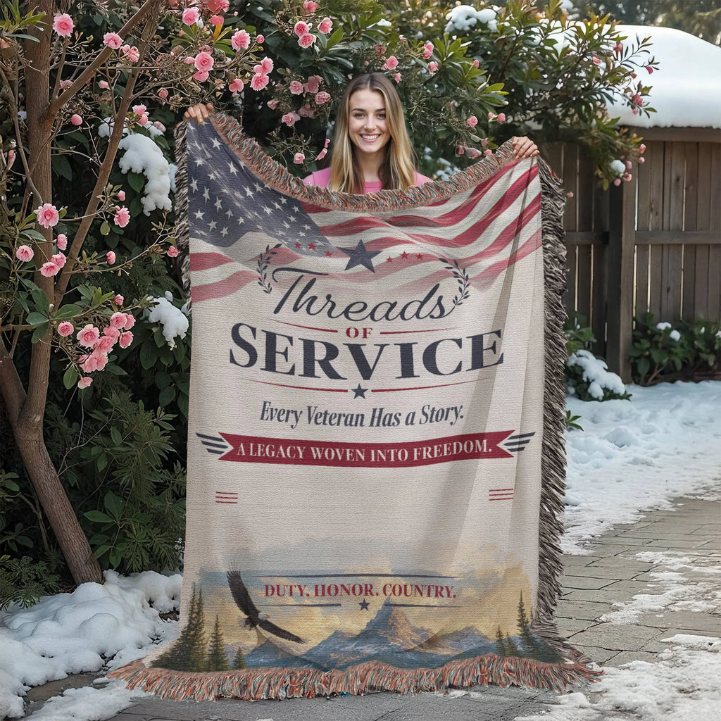 Woven veteran keepsake blanket featuring an American flag, mountain landscape, and patriotic text with fringed edges.