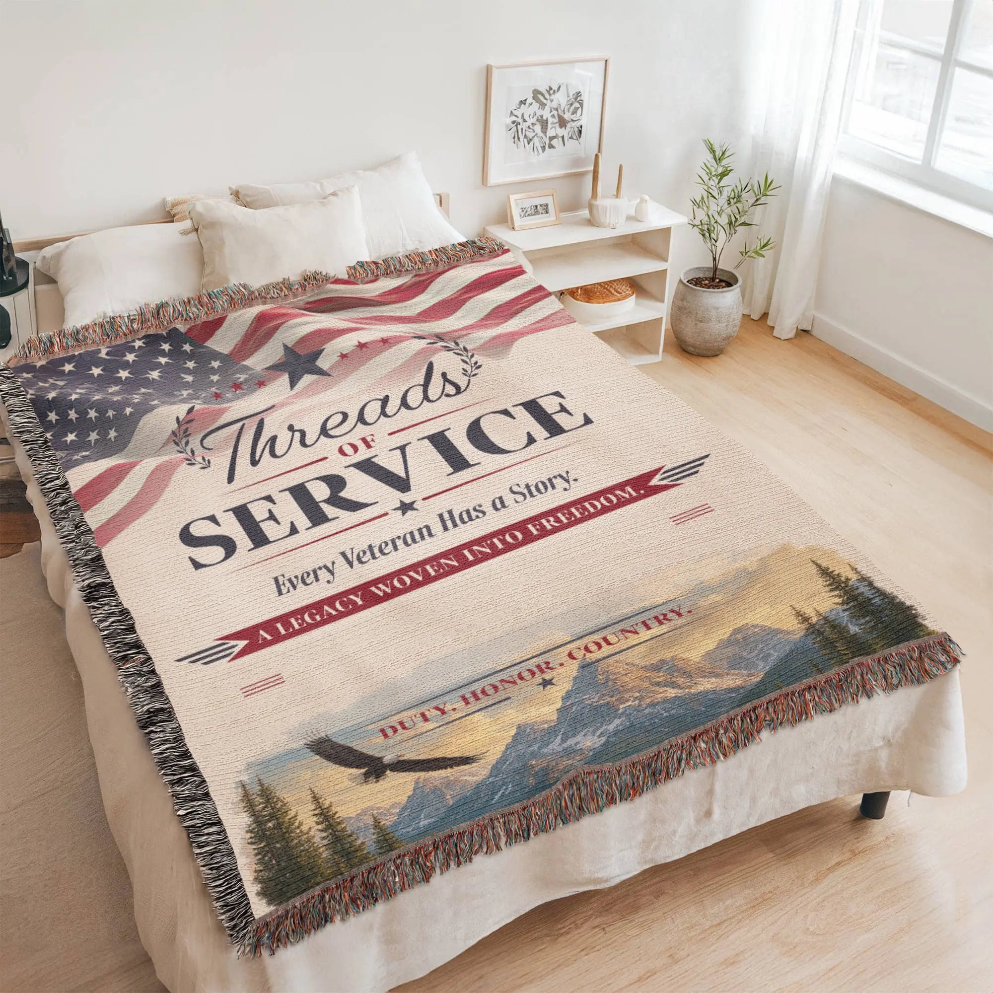 Woven veteran throw blanket featuring an American flag, mountain landscape, eagle, and patriotic text on a cream background.